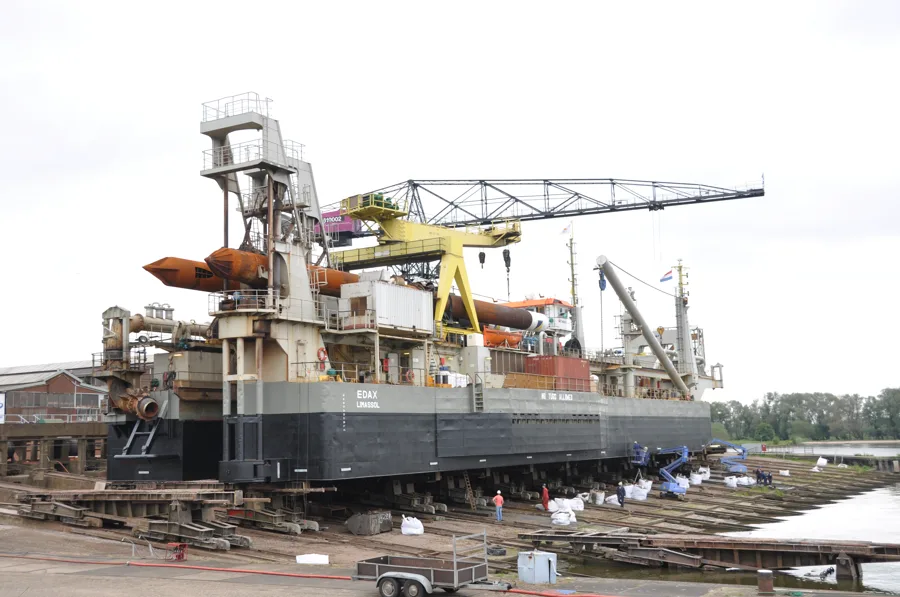 Cutter suction dredger docked for maintenance on a slipway